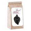 A bag of black wax for waxing and hair removal.