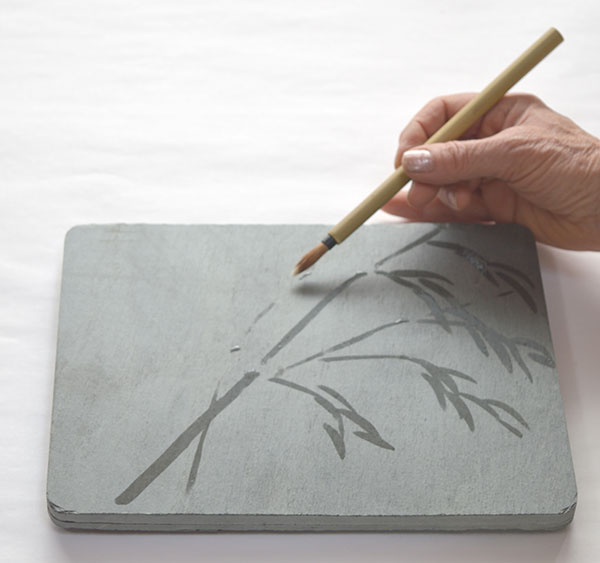 Drawing bamboo on a wishing stone